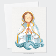 Show thumbnail preview	 Illustration of the virgin mary on a greeting card, depicted with a serene expression and clasped hands, wearing a blue robe and white veil with gold accents, set against a neutral background.