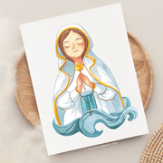 Show thumbnail preview	 Illustration of the virgin mary on a greeting card, depicted with a serene expression and clasped hands, wearing a blue robe and white veil with gold accents, set against a neutral background.