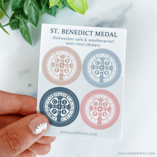 Includes 4 St. Benedict Medal stickers that are dishwasher safe & weatherproof. Features pink, nude, blue, and navy stickers