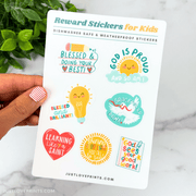 Sticker sheet with seven colorful reward stickers for kids, including phrases like “God is Proud of You” and “Blessed & Doing Your Best.”