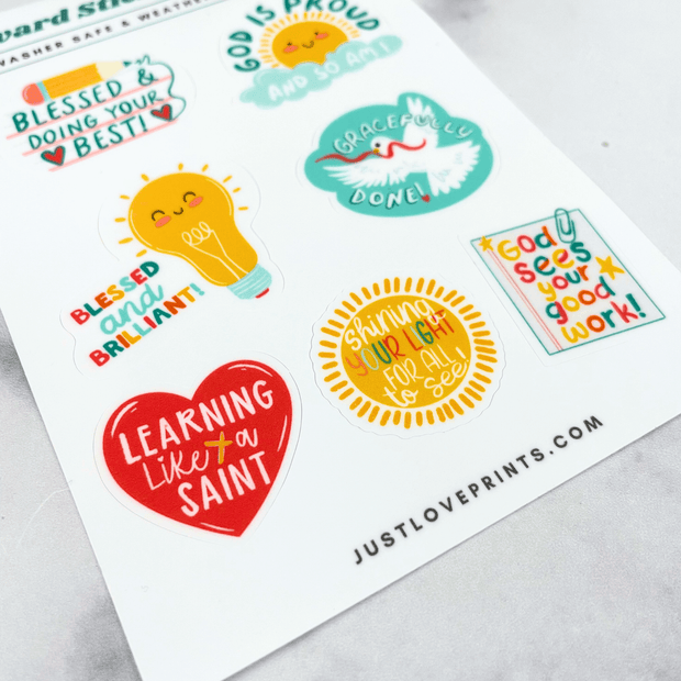 Sheet of colorful motivational stickers with text and graphics on a white background.