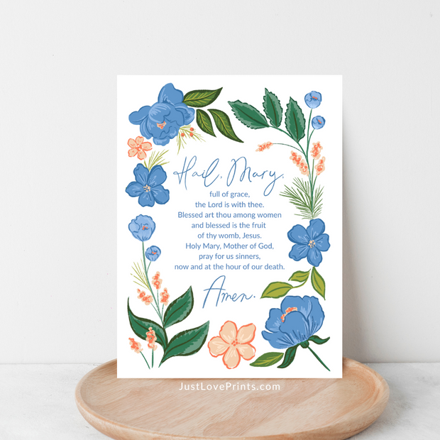 Small floral print with full text of the Hail Mary prayer surrounded by blue flowers.