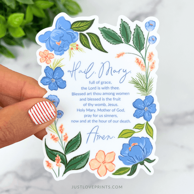 Floral vinyl sticker with the full text of the Hail Mary prayer surrounded by blue and peach flowers.