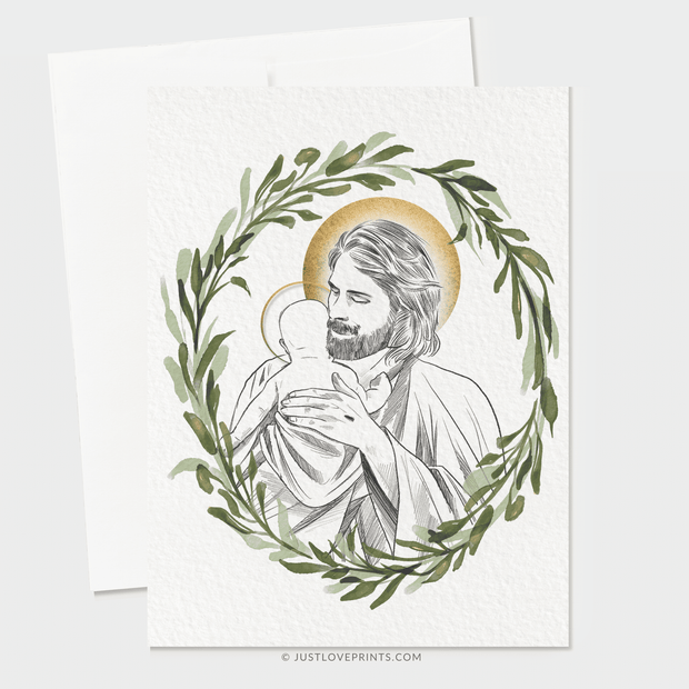 Line drawing of Jesus holding a baby, both with Halos, surrounded by a green wreath. 