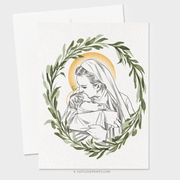 Line drawing of Mary holding a baby, both with Halos, surrounded by a green wreath. 