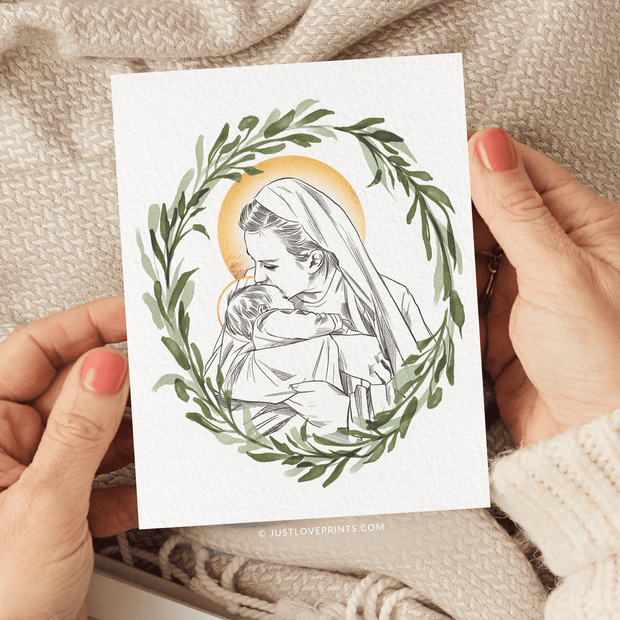 Line drawing of Mary holding a baby, both with Halos, surrounded by a green wreath. 