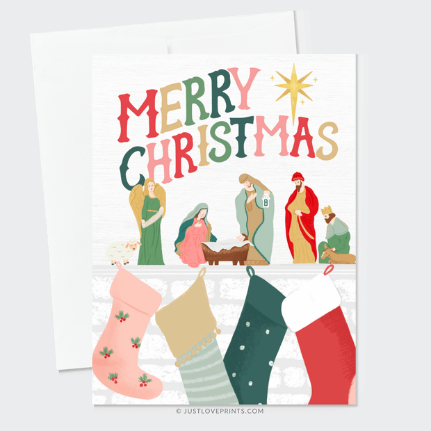 This festive card design spreads holiday cheer with a vibrant "Merry Christmas" message at the top in bold, colorful letters. Below, a classic nativity scene features Mary, Joseph, Baby Jesus in the manger, an angel, shepherds, and the Magi, all illustrated in warm, earthy tones. Above a cozy fireplace, stockings in various colors and patterns are hung with care, adding a touch of traditional Christmas spirit. The scene is topped with a bright star, symbolizing the Star of Bethlehem. 