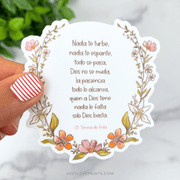 Vinyl sticker with “Nada te turbe, nada te espante” prayer in Spanish, framed with pink and orange floral artwork.
