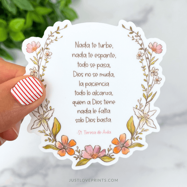 Vinyl sticker with “Nada te turbe, nada te espante” prayer in Spanish, framed with pink and orange floral artwork.