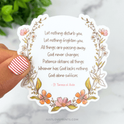Floral vinyl sticker with St. Teresa of Avila’s prayer text, surrounded by pink and orange flowers.