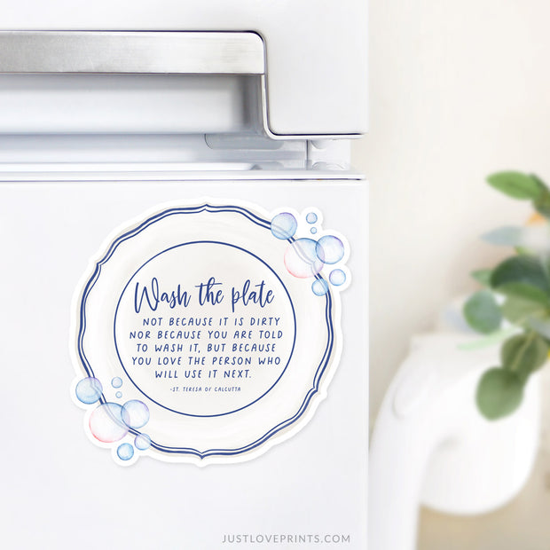 Magnet shaped like a plate with bubbles and the quote “Wash the plate… because you love the person who will use it next.”
