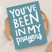 blue background with stars and big letters "You've been in my prayers"
