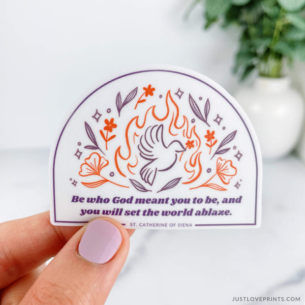 white sticker with purple border, flames, and florals, with quote be who God meant you to be and you will set the world ablaze.