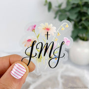 Colorful floral sticker on a clear background with JMJ.